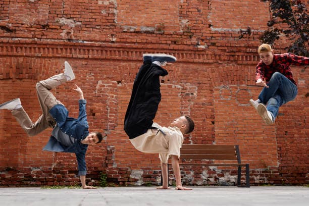 Breakdance crew in a dynamic street-style freeze