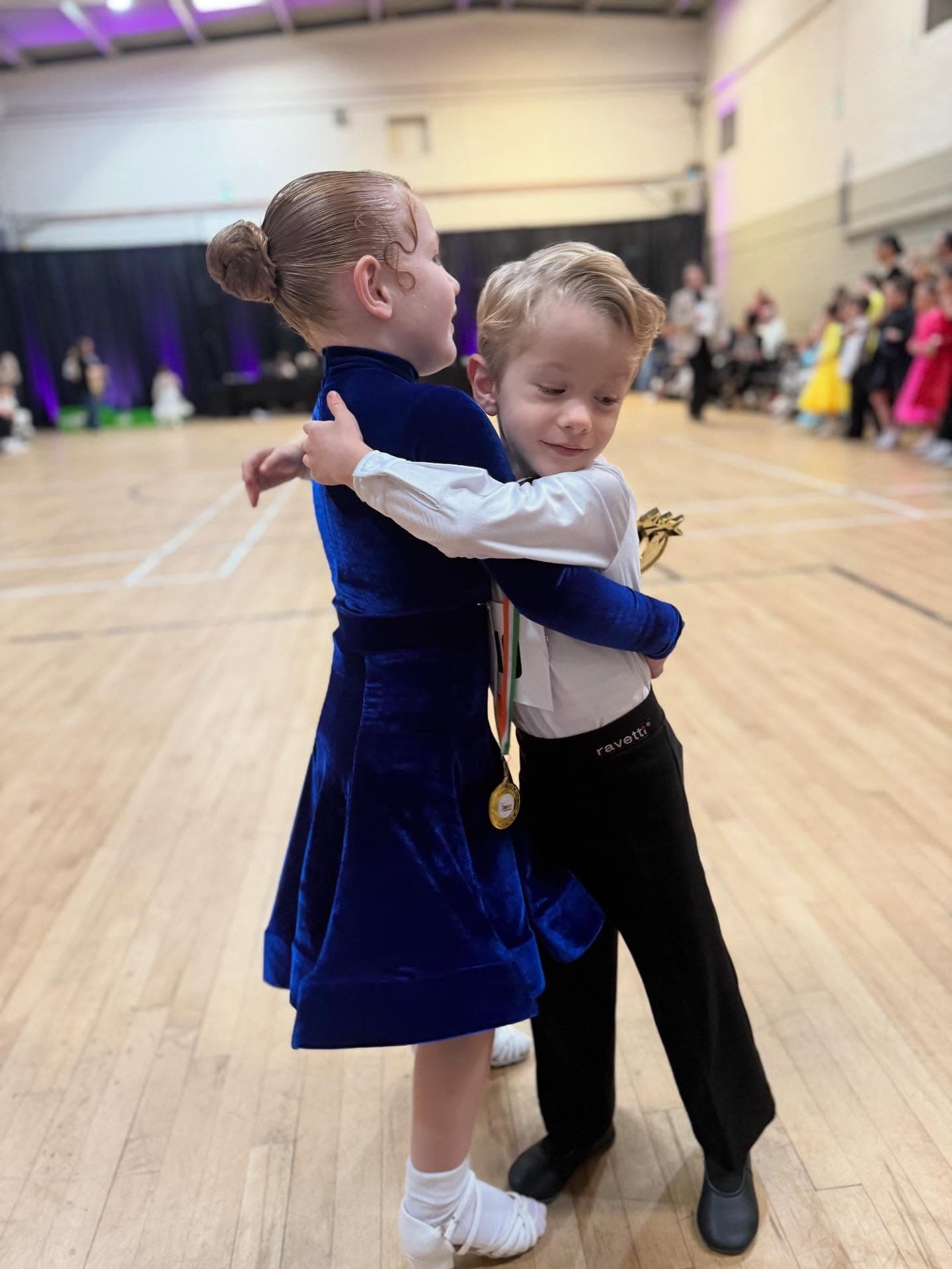 Children celebrating together at a dance event